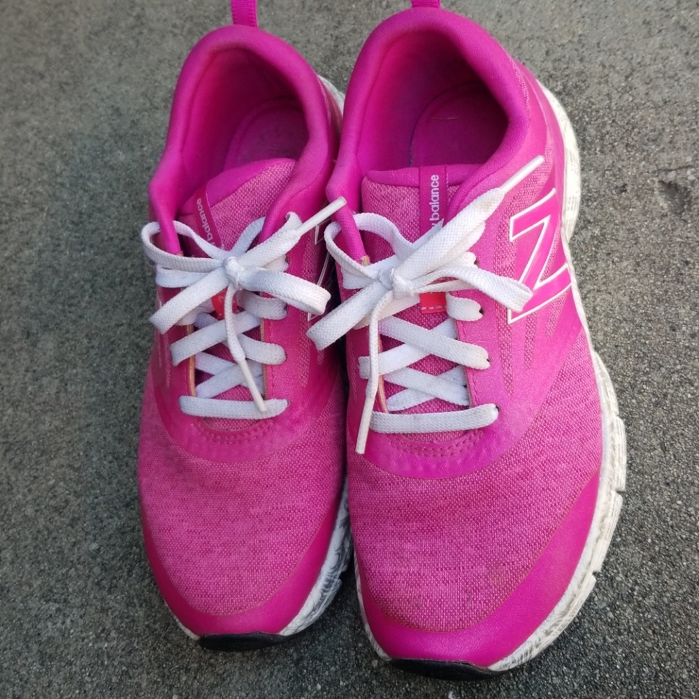Pink new balance walking shoes
